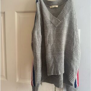 Grey sweatshirt, red white and blue stripe on sleeves